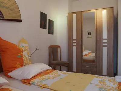 Ein Bett oder Betten in einem Zimmer der Unterkunft Haus Haupt