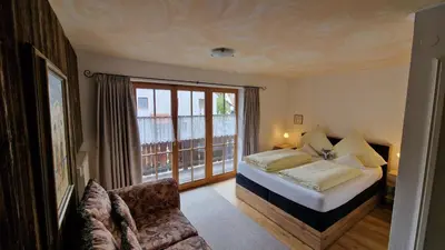 Ein Bett oder Betten in einem Zimmer der Unterkunft Hotel Ferienhaus Fux