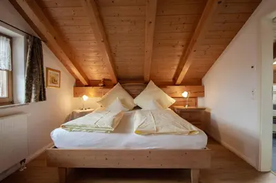 Ein Bett oder Betten in einem Zimmer der Unterkunft Hotel Ferienhaus Fux