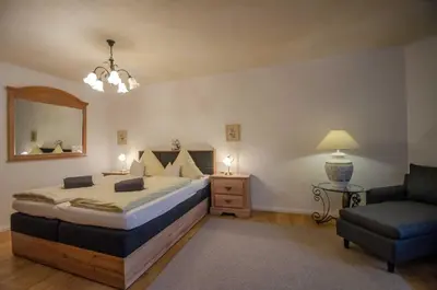Ein Bett oder Betten in einem Zimmer der Unterkunft Hotel Ferienhaus Fux