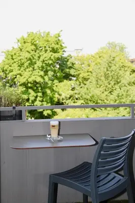 Ein Balkon oder eine Terrasse in der Unterkunft Hotel New Orly
