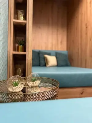 Ein Sitzbereich in der Unterkunft Hotel New Orly