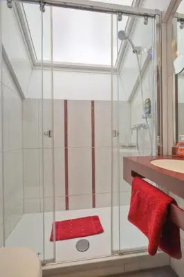 Ein Badezimmer in der Unterkunft Hotel Condor