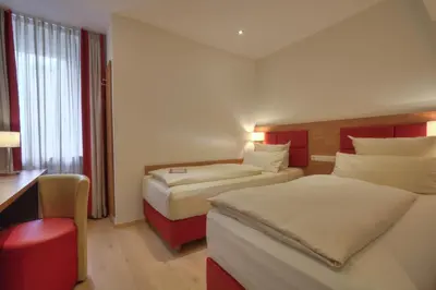 Ein Bett oder Betten in einem Zimmer der Unterkunft Hotel Condor