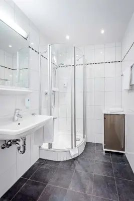Ein Badezimmer in der Unterkunft Laimer Hof am Schloss Nymphenburg