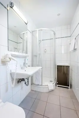 Ein Badezimmer in der Unterkunft Laimer Hof am Schloss Nymphenburg