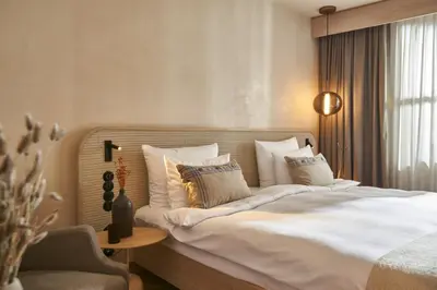 Ein Bett oder Betten in einem Zimmer der Unterkunft Platzl Hotel - Superior