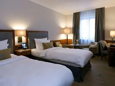 Ein Bett oder Betten in einem Zimmer der Unterkunft Platzl Hotel - Superior