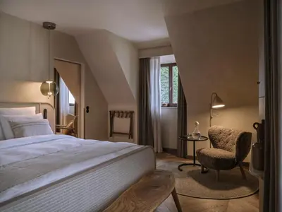 Ein Bett oder Betten in einem Zimmer der Unterkunft Platzl Hotel - Superior