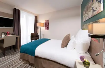 Ein Bett oder Betten in einem Zimmer der Unterkunft Leonardo Hotel Munich City Olympiapark