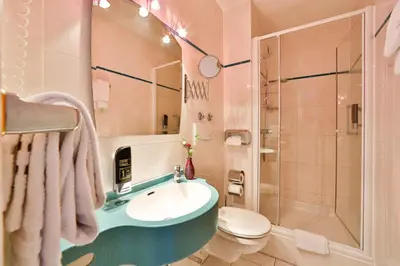 Ein Badezimmer in der Unterkunft Superior Hotel Präsident