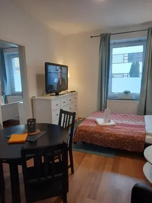 Ein Bett oder Betten in einem Zimmer der Unterkunft Gemütliche Wohnung zentral Augsburg