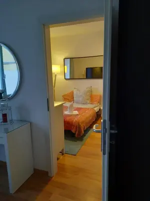 Ein Bett oder Betten in einem Zimmer der Unterkunft Gemütliche Wohnung zentral Augsburg