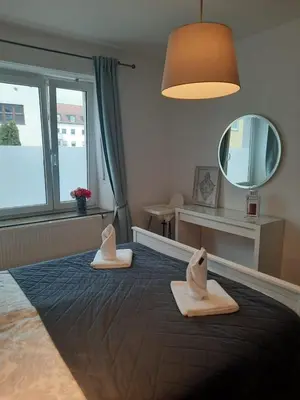 Ein Bett oder Betten in einem Zimmer der Unterkunft Gemütliche Wohnung zentral Augsburg