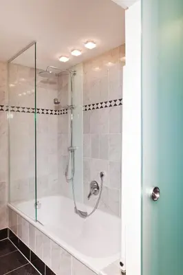 Ein Badezimmer in der Unterkunft DER HEIDEHOF Conference & SPA Resort