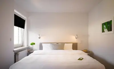 Ein Bett oder Betten in einem Zimmer der Unterkunft Hotel Wetterstein