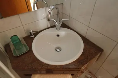 Ein Badezimmer in der Unterkunft Hotel Neumayr