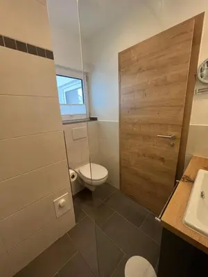 Ein Badezimmer in der Unterkunft Hotel garni Alpengruss