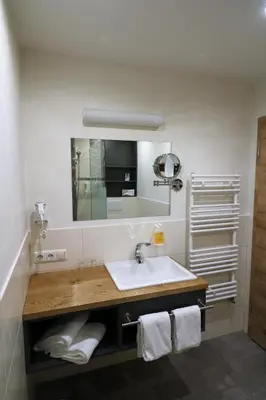Ein Badezimmer in der Unterkunft Hotel garni Alpengruss