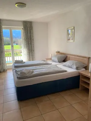 Ein Bett oder Betten in einem Zimmer der Unterkunft Appartementresidenz König Ludwig