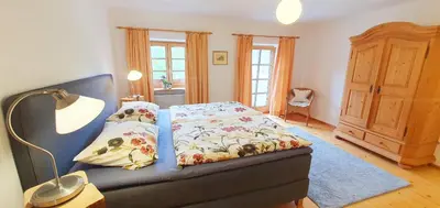 Ein Bett oder Betten in einem Zimmer der Unterkunft Stadlerhof