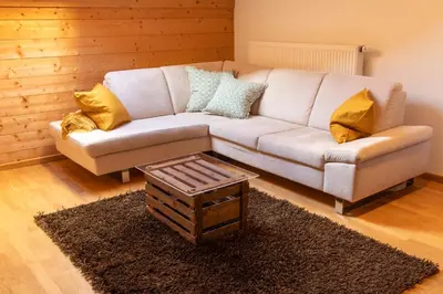 Ein Sitzbereich in der Unterkunft Stadlerhof