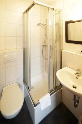 Ein Badezimmer in der Unterkunft Hotel Christl