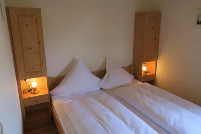 Ein Bett oder Betten in einem Zimmer der Unterkunft Gasthof Tiroler Hof