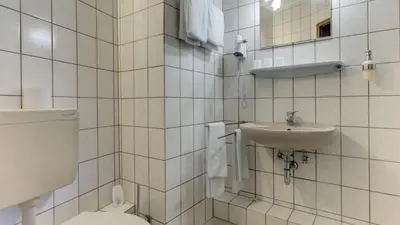 Ein Badezimmer in der Unterkunft Hotel Luitpold