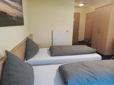 Ein Bett oder Betten in einem Zimmer der Unterkunft Wirtshaus Zur Bina