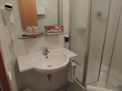Ein Badezimmer in der Unterkunft Hotel-Gasthof Eberherr