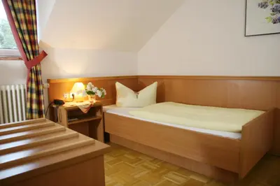 Ein Bett oder Betten in einem Zimmer der Unterkunft Hotel-Gasthof Eberherr