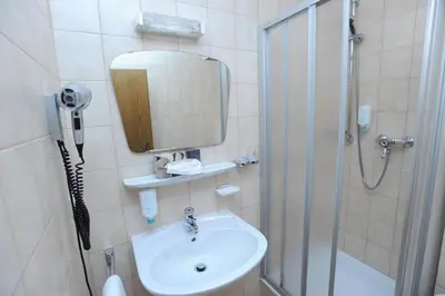Ein Badezimmer in der Unterkunft Hotel Reischenau