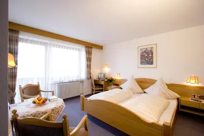 Ein Bett oder Betten in einem Zimmer der Unterkunft Kurhotel Dornröschen
