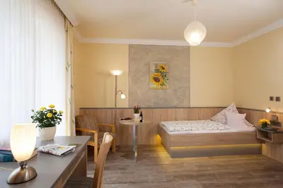 Ein Sitzbereich in der Unterkunft Kurhotel Dornröschen