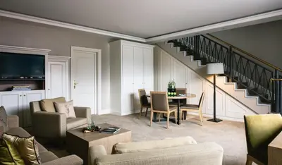 Ein Sitzbereich in der Unterkunft Althoff Seehotel Überfahrt