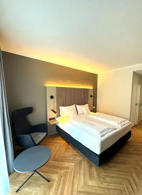 Ein Bett oder Betten in einem Zimmer der Unterkunft Altstadthotel