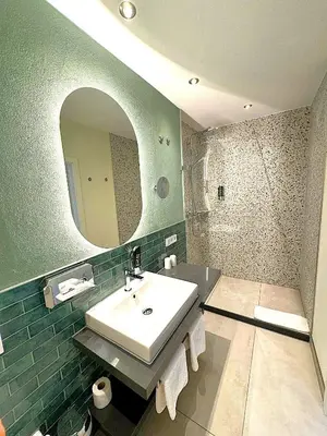 Ein Badezimmer in der Unterkunft Altstadthotel