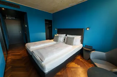 Ein Bett oder Betten in einem Zimmer der Unterkunft Roomreich