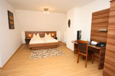 Ein Bett oder Betten in einem Zimmer der Unterkunft Hotel Landgasthof Euringer