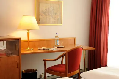 Ein Bett oder Betten in einem Zimmer der Unterkunft Hotel Isartor