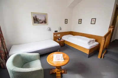 Ein Bett oder Betten in einem Zimmer der Unterkunft Villa am Park