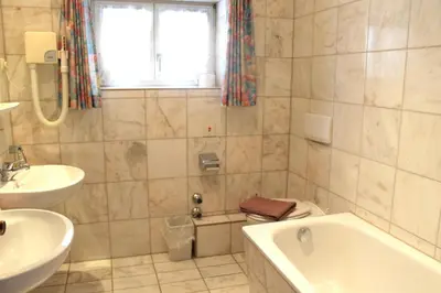 Ein Badezimmer in der Unterkunft Villa am Park