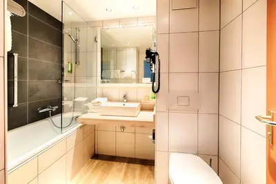 Ein Badezimmer in der Unterkunft Holiday Inn Munich - South by IHG