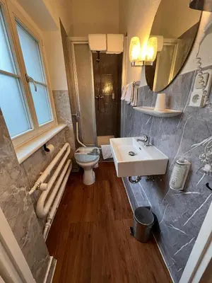 Ein Badezimmer in der Unterkunft Hotel Galleria