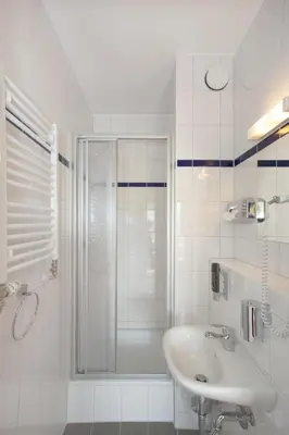Ein Badezimmer in der Unterkunft a&o München Hauptbahnhof