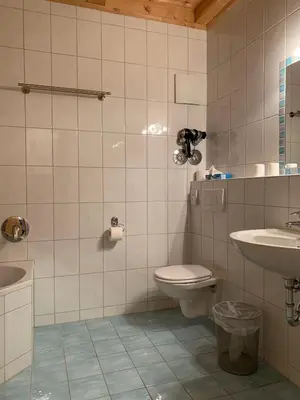 Ein Badezimmer in der Unterkunft Zum Dammerbauer