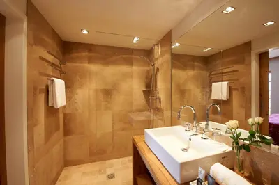 Ein Badezimmer in der Unterkunft Das Achental Resort