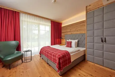 Ein Bett oder Betten in einem Zimmer der Unterkunft Das Achental Resort