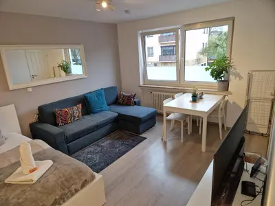Ein Sitzbereich in der Unterkunft Schöne Wohnung zentral Dachau(20 min zum HBF München)